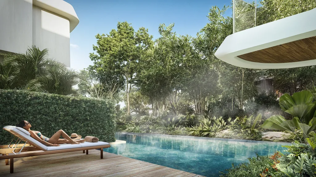 A pool screened by a clipped hedge, with two sun loungers on a timber deck and a curved white soffit overhead, at Eldeco 7 Peaks Residences, Omicron 1A — builder render, artistic visualisation